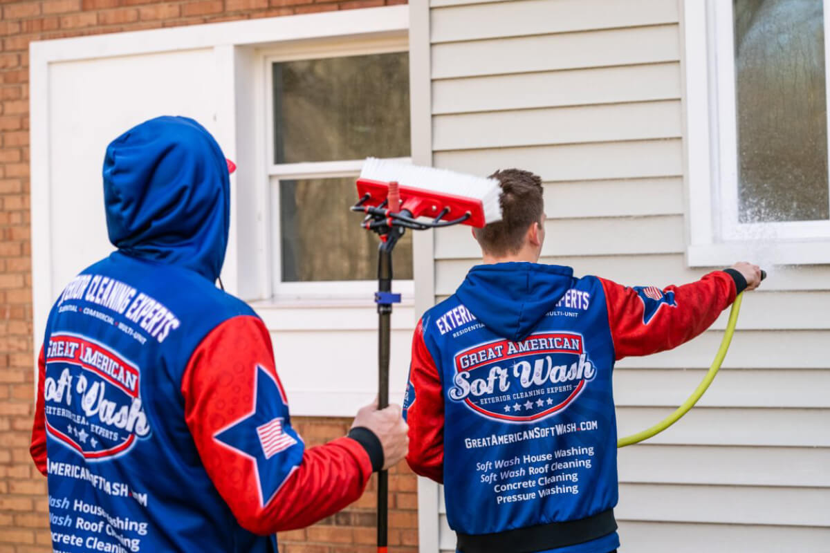 expert soft washing crew cleaning a house in indian hill oh